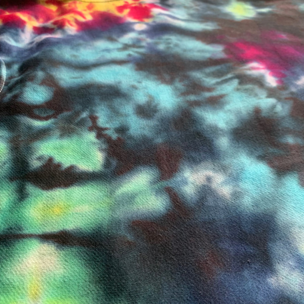 organic sweatshirt tie dyed with black, navy, blue, green, pink yellow and red